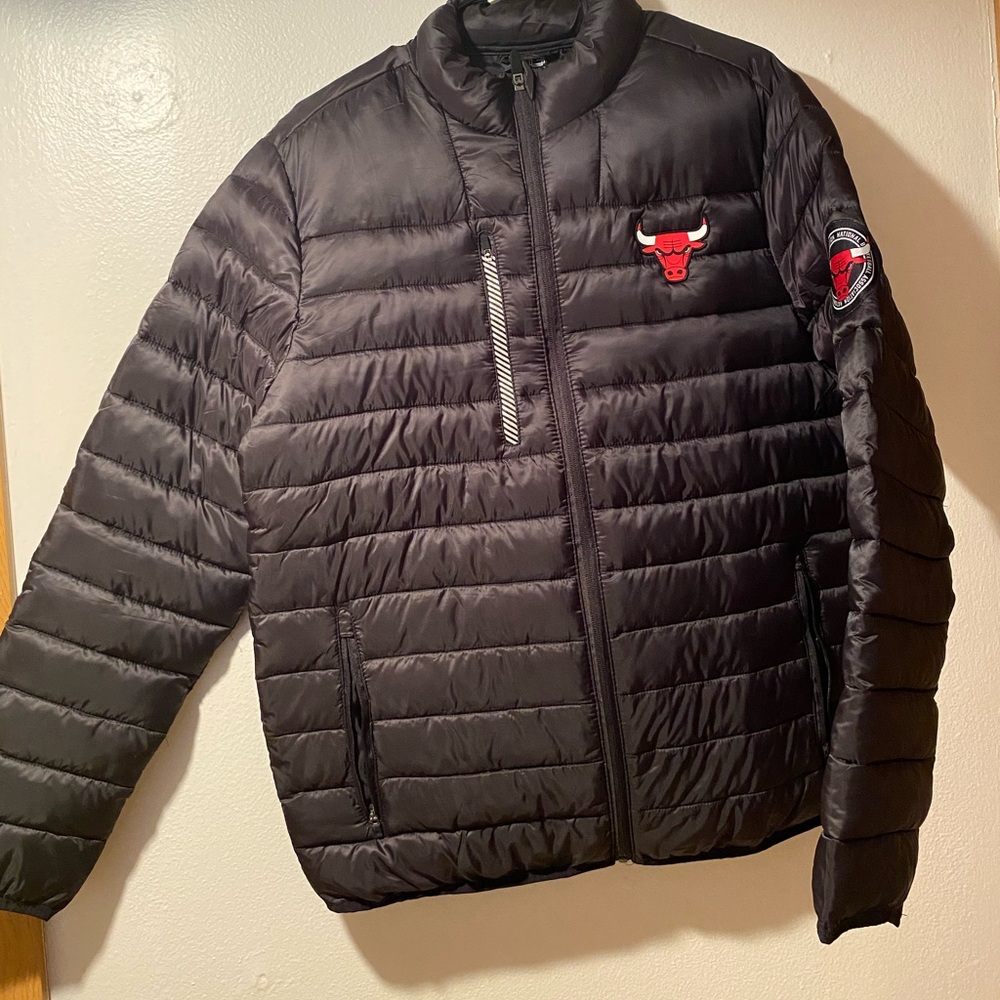 Size medium black Chicago Bulls jacket never worn